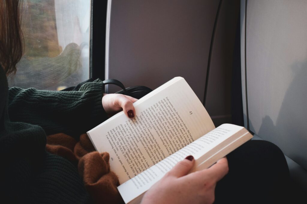 Reading personal development books during a productive morning routine